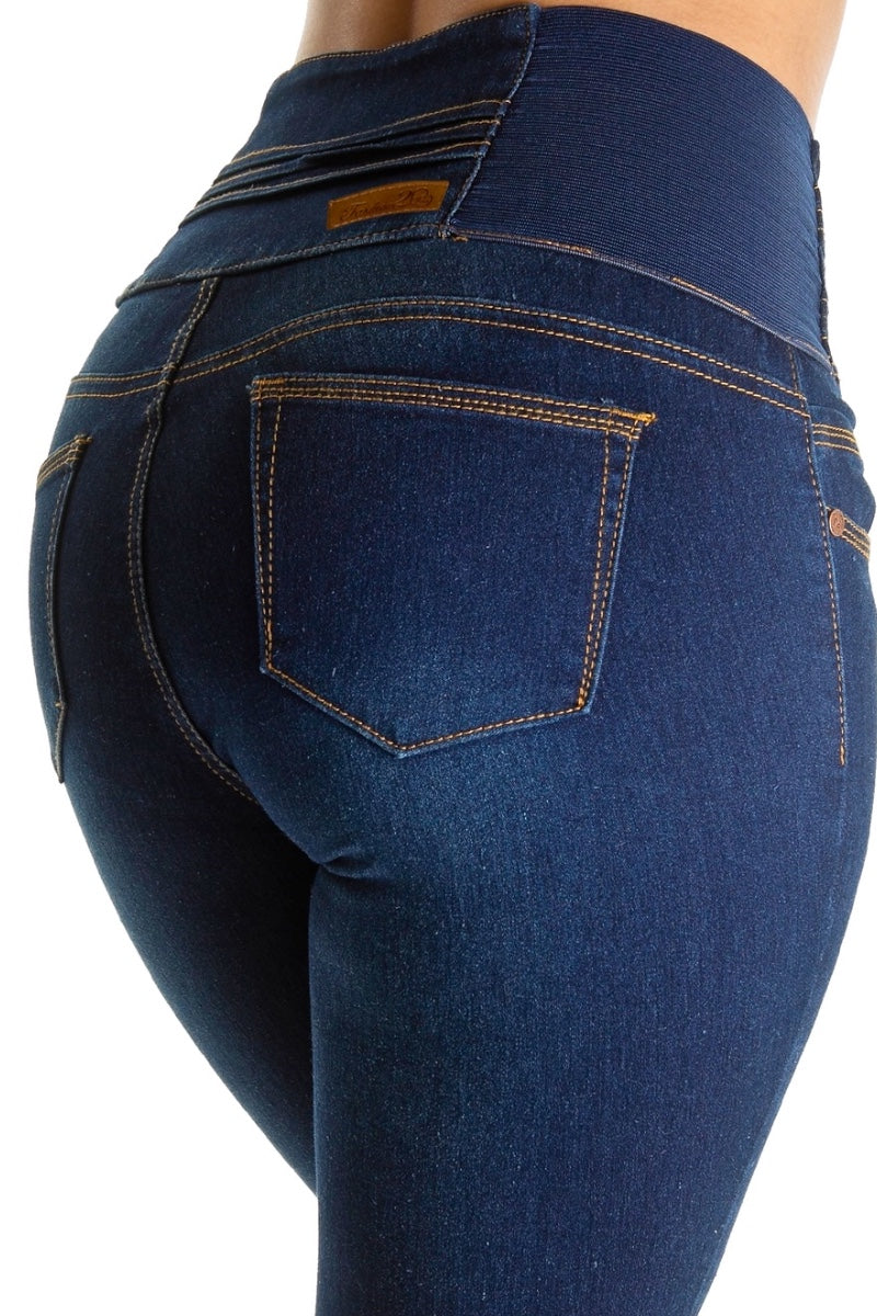 Blue jeans with a visible brand label on a white background