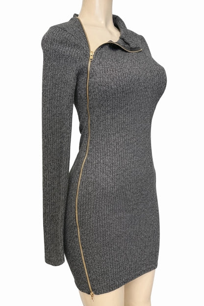 black textured dress with a zipper on a mannequin against a white background