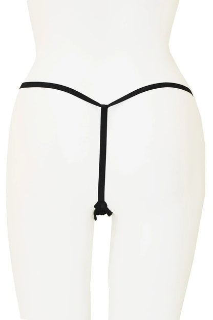 Black thong on a white mannequin against a white background