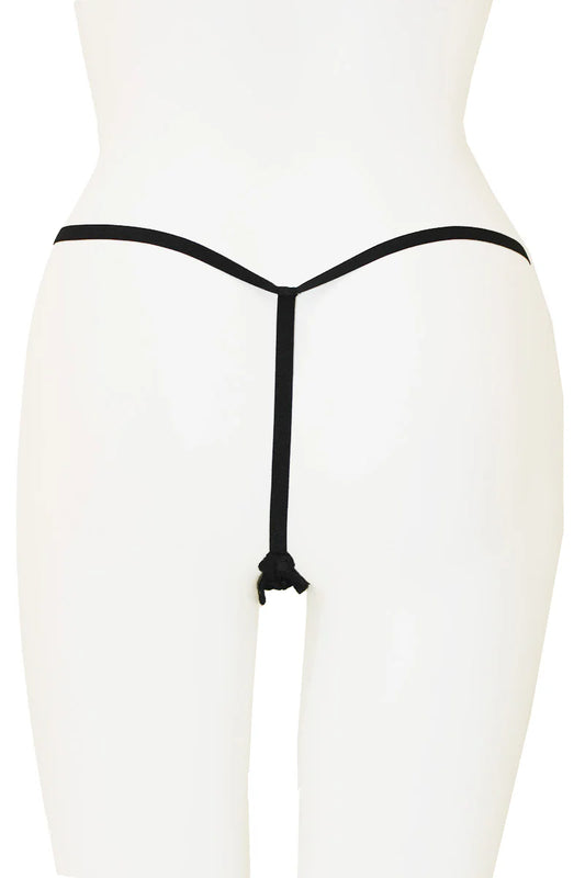 Black thong on a white mannequin against a white background