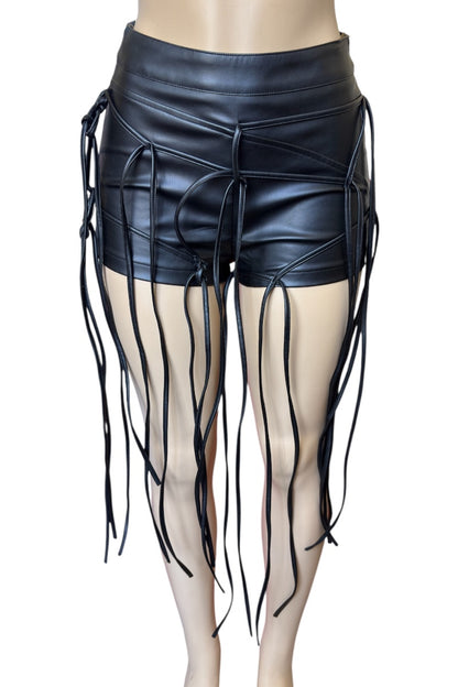 Black leather mini shorts with fringe details on a white background