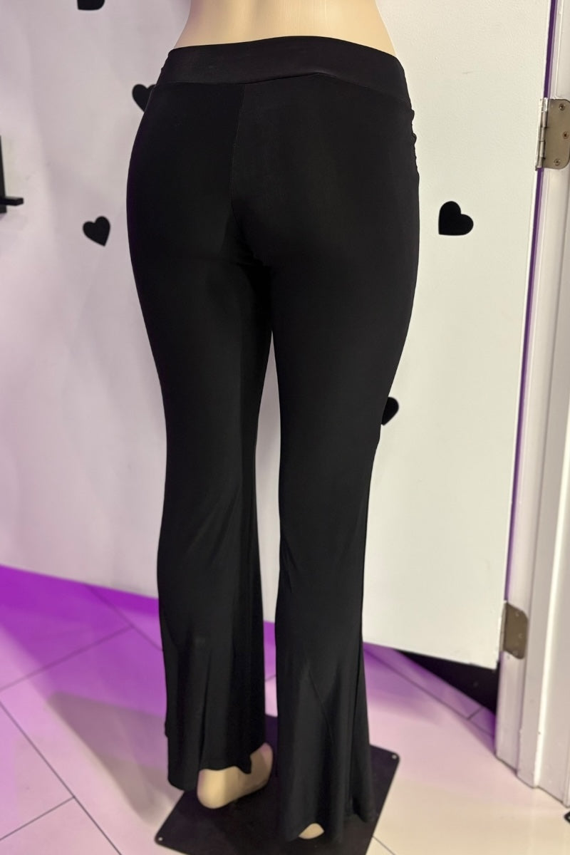 Black pants on a mannequin against a white background