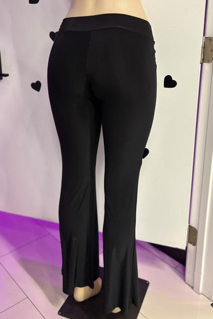 Black pants on a mannequin against a white background