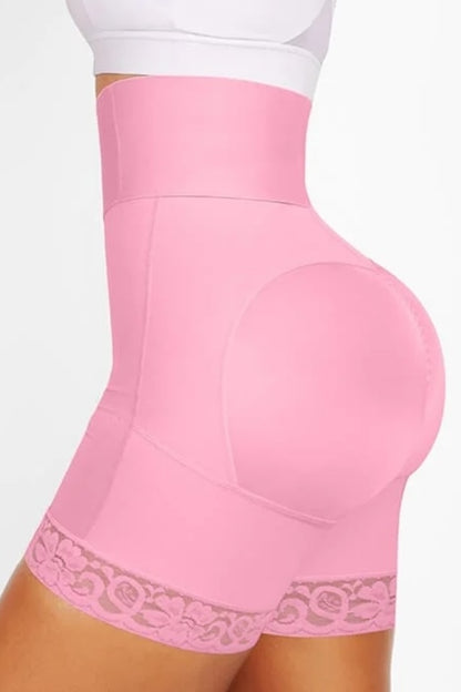 Pink shapewear with lace trim on a white background