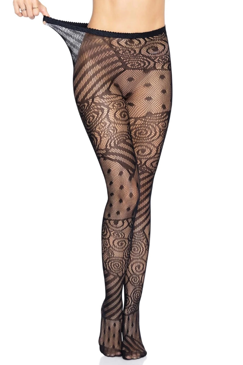 Black sheer patterned tights with a lace-like spiral and polka dot design, shown on a model's legs against a white background.
