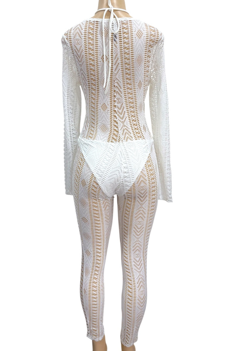 White lace cover-up on a mannequin against a white background