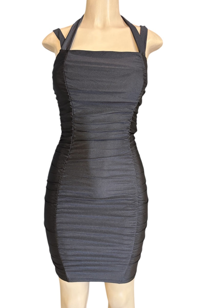 Black halter neck dress on a mannequin against a white background