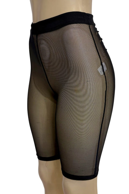 Black sheer mesh shorts with black trim, shown on a mannequin from a side/back angle against a white background.