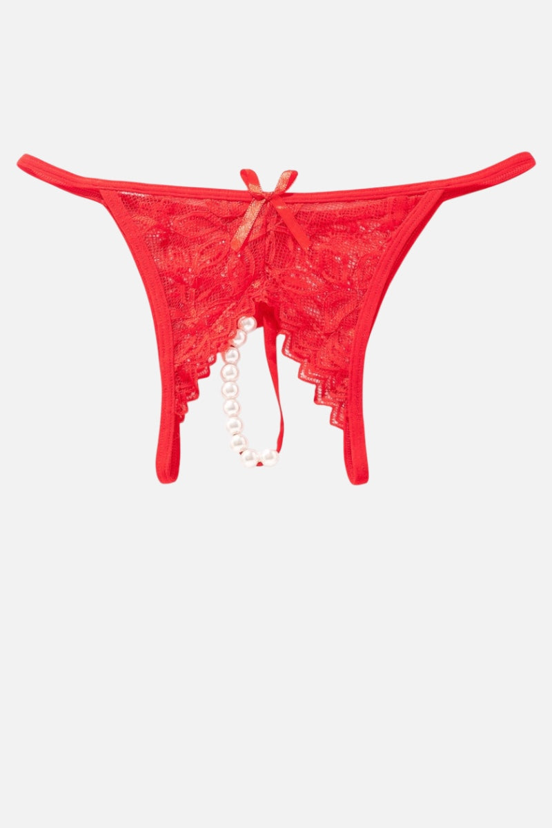 Red lace thong underwear with a bow at the center front and a dangling pearl bead chain, shown on a plain light gray background.