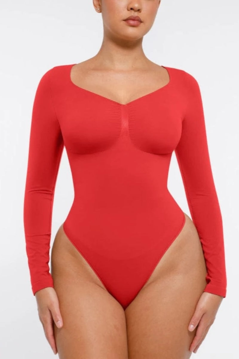 Red bodysuit worn by a model on a white background