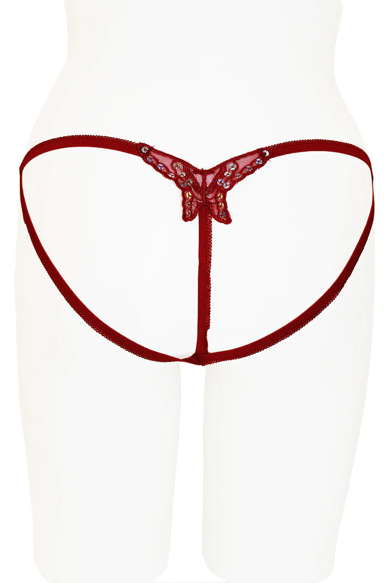 Red lingerie thong on a white background