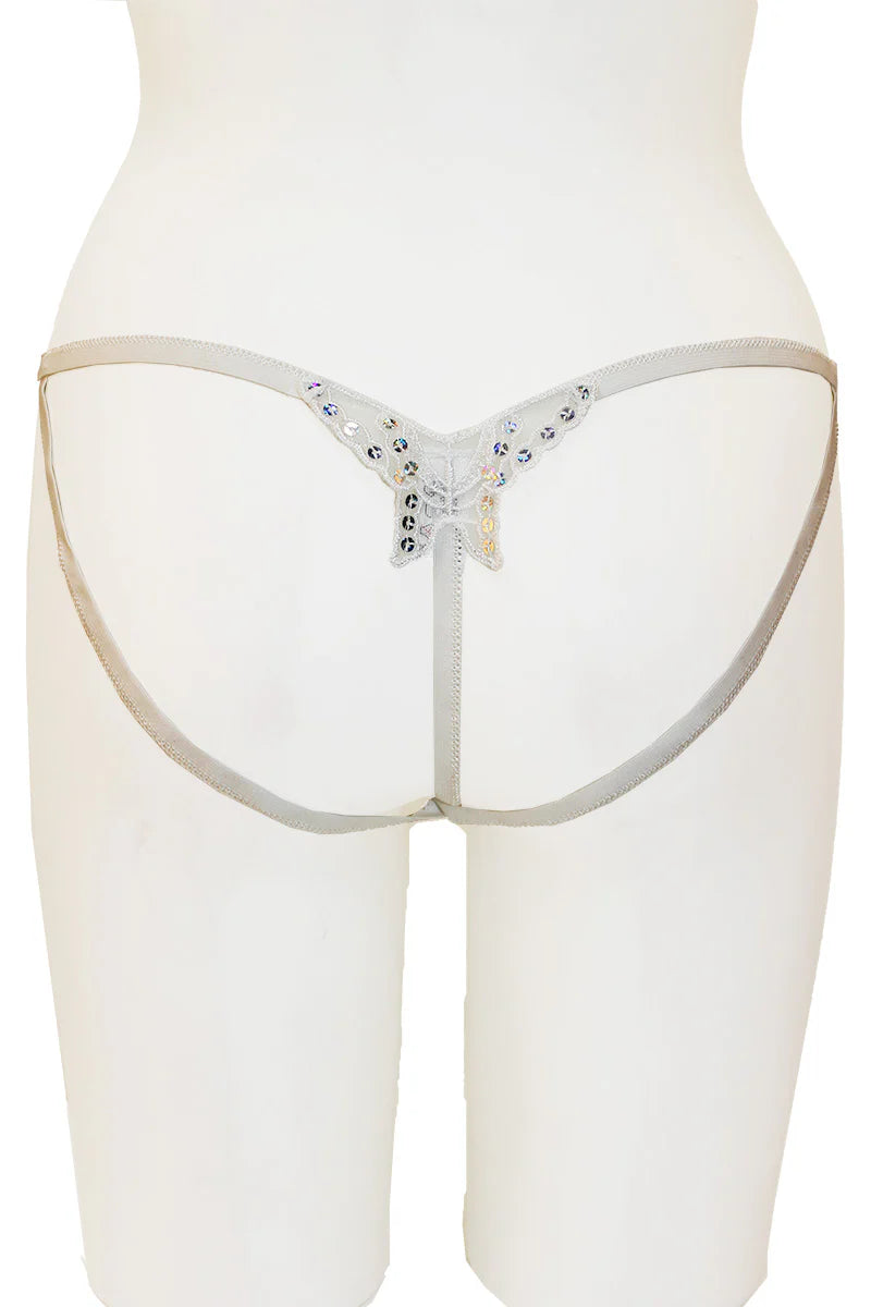 White thong with embellishments on a white background