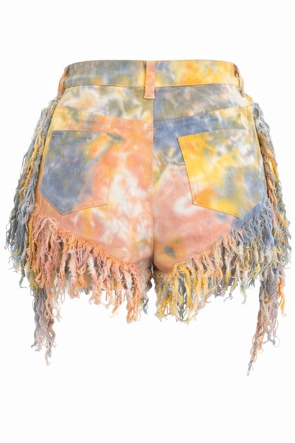 Tie-dye shorts with fringes on a white background