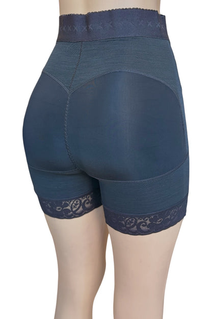 High-waisted compression or shapewear shorts in a black color, featuring a lace trim at the hem and a textured waistband, shown on a mannequin from the back.