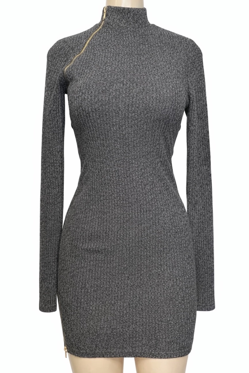 black knit dress on a mannequin against a white background