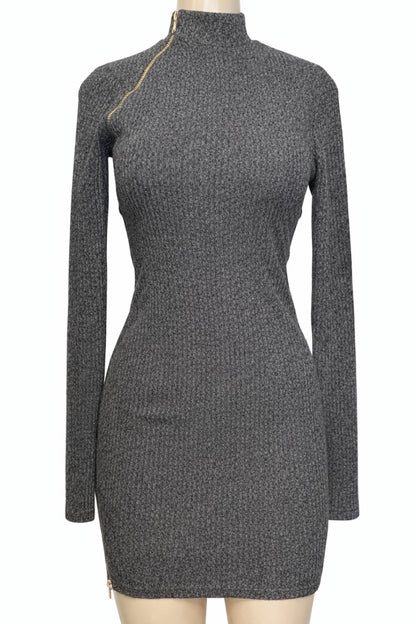 black knit dress on a mannequin against a white background