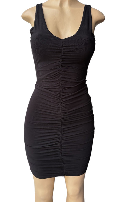 Black dress on a mannequin against a white background