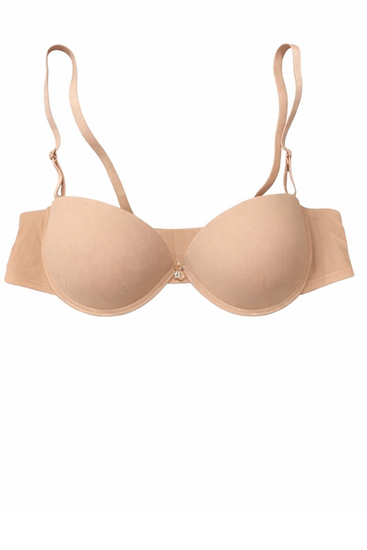 Beige bra on a white background