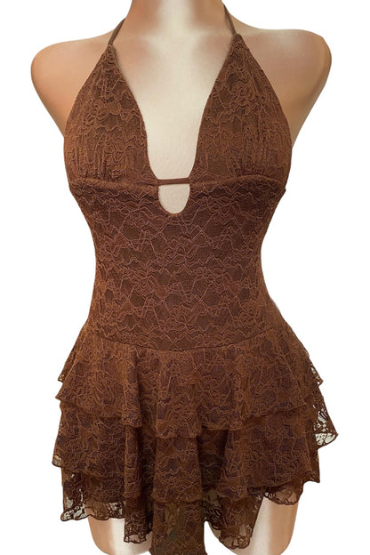 Brown lace dress on a mannequin against a white background
