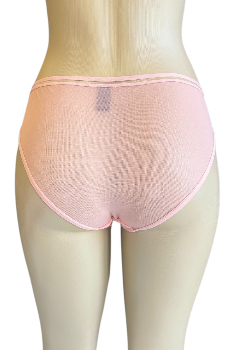 Pink underwear on a mannequin against a white background