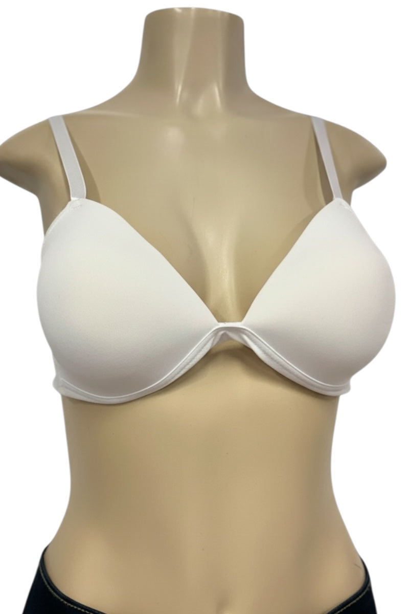 White bra on a mannequin with a plain background