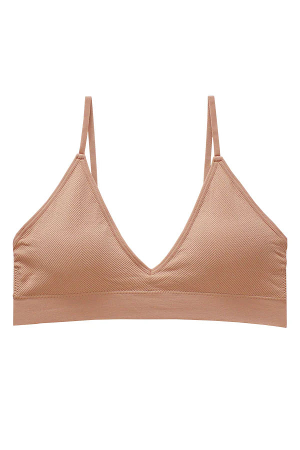 Beige bralette on a white background