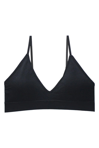 Black bralette with thin straps on a white background