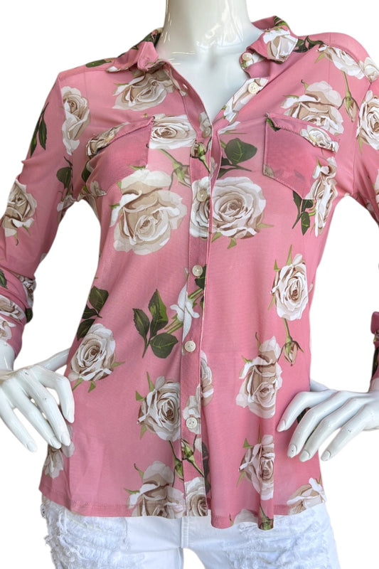 Pink floral shirt on a mannequin with a white background
