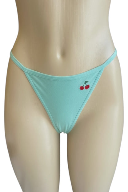light blue bottom with cherry design on a mannequin against a white background