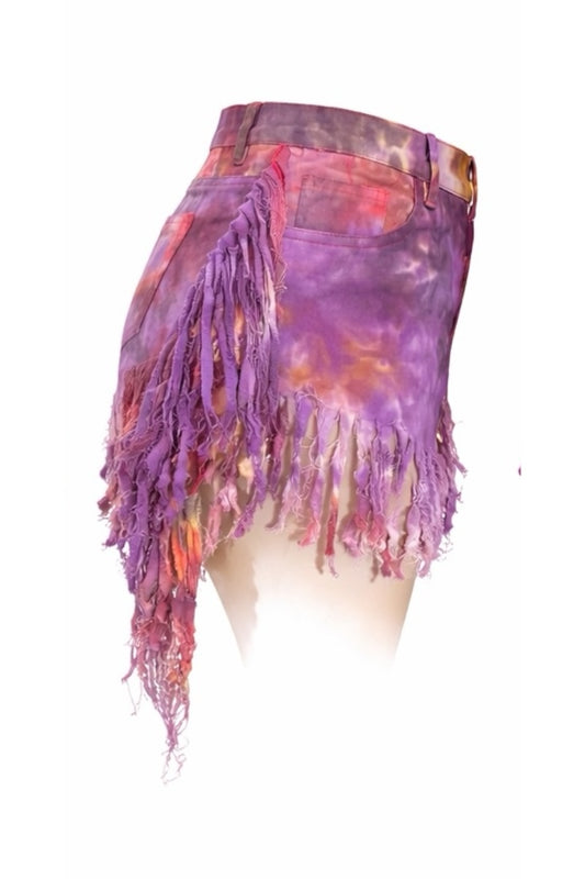 Tie-dye shorts with fringe on a white background