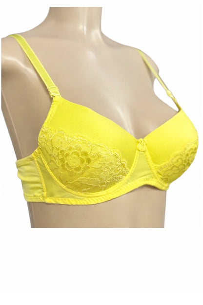 Yellow bra on a mannequin with a white background