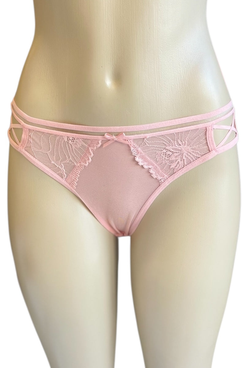 Pink lace underwear on a mannequin against a white background