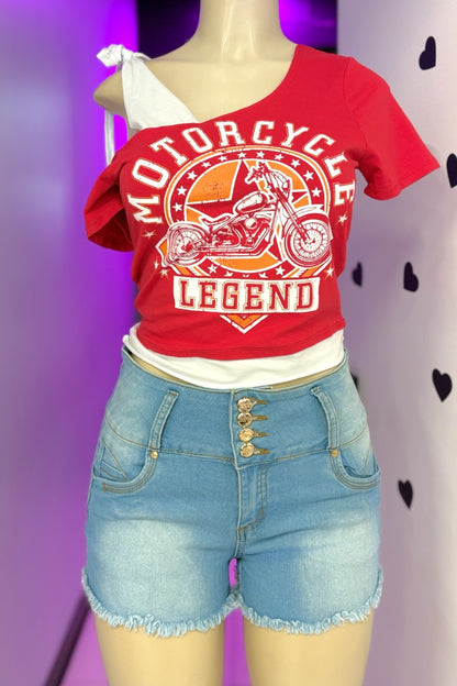 Red t-shirt with 'Motorcycle Legend' design and denim shorts on a mannequin against a purple and white background.