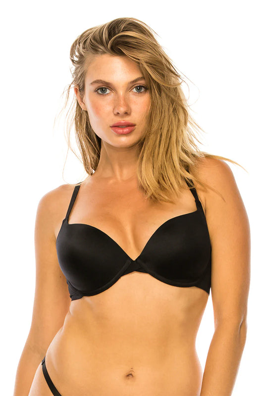 Woman wearing a black bra on a white background