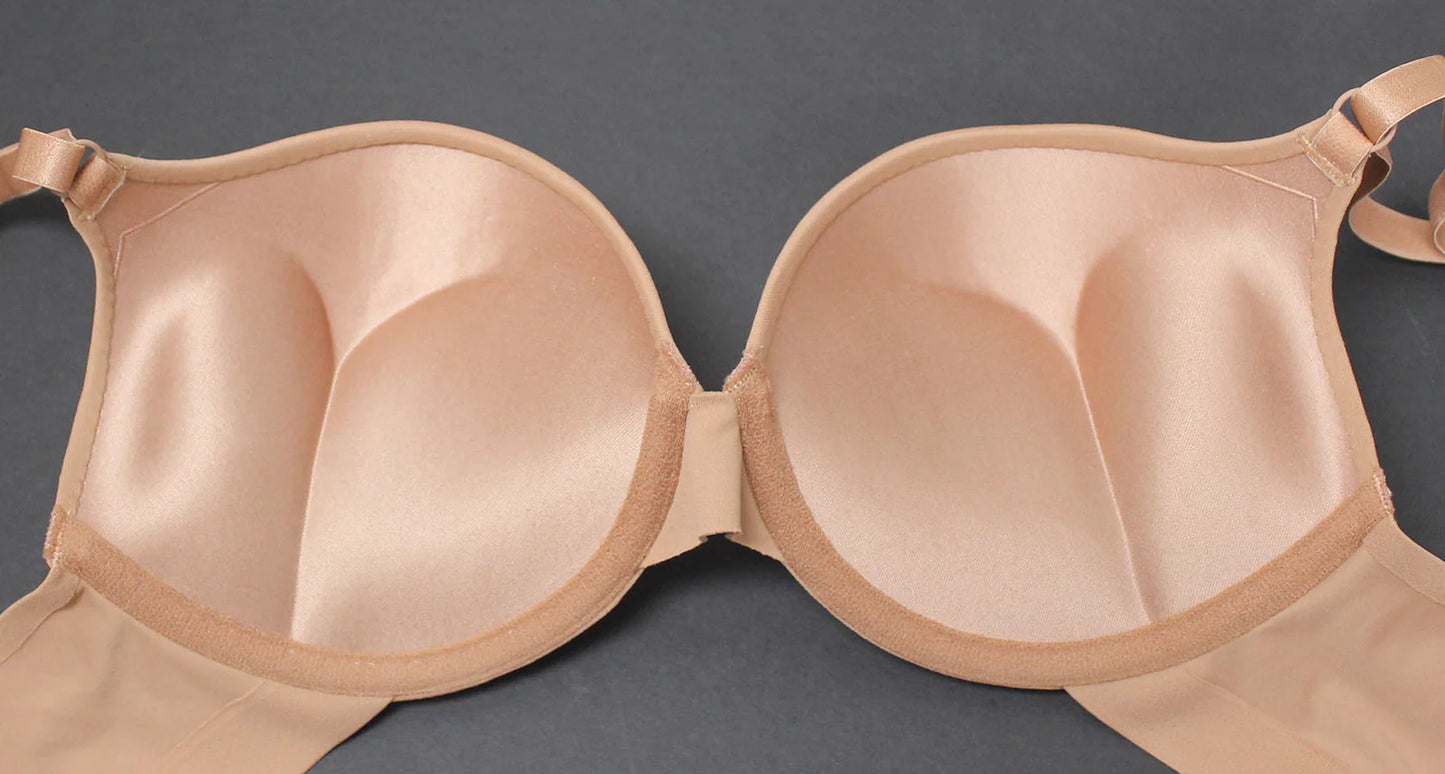 Beige bra on a gray background