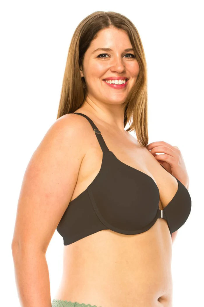 Woman wearing a black bra on a white background