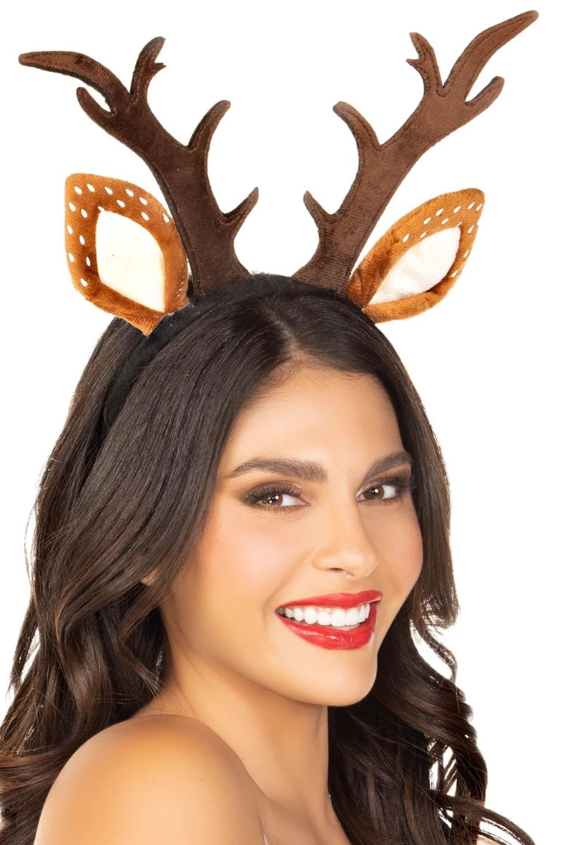 A woman wearing a brown reindeer antler headband with tan and white patterned ears, shown against a plain white background.