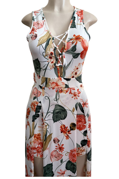 Floral dress on a mannequin against a white background