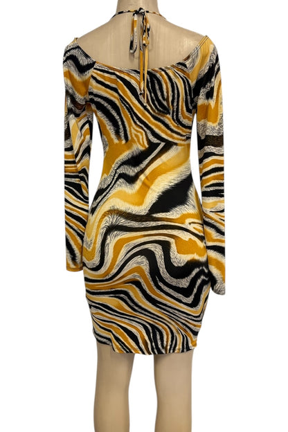 Patterned dress on a mannequin with a white background