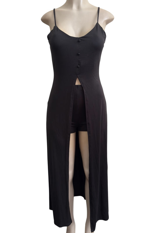 Black dress set with a slit on a mannequin against a white background