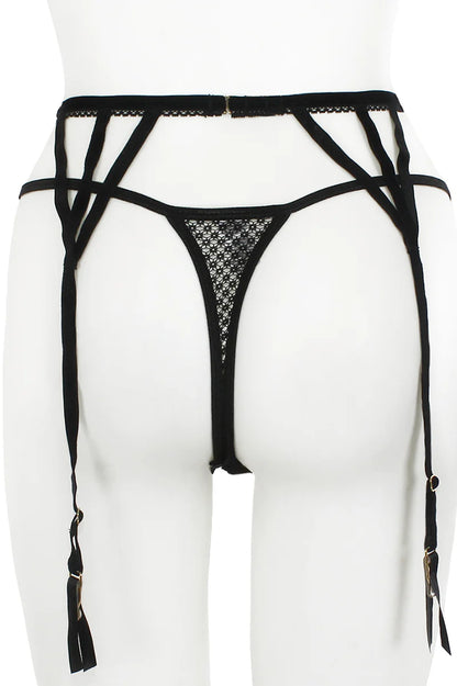 Black strappy lingerie set on a white mannequin