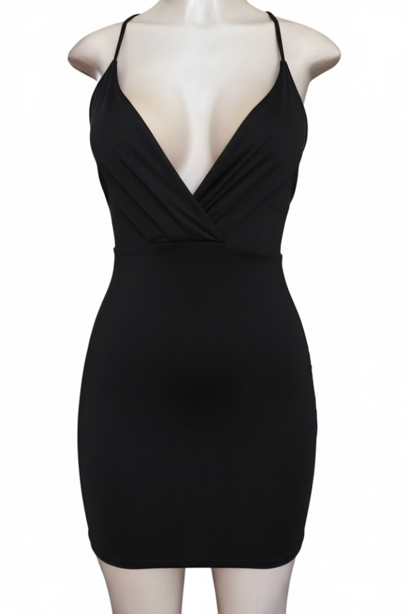 Black dress on a mannequin against a white background