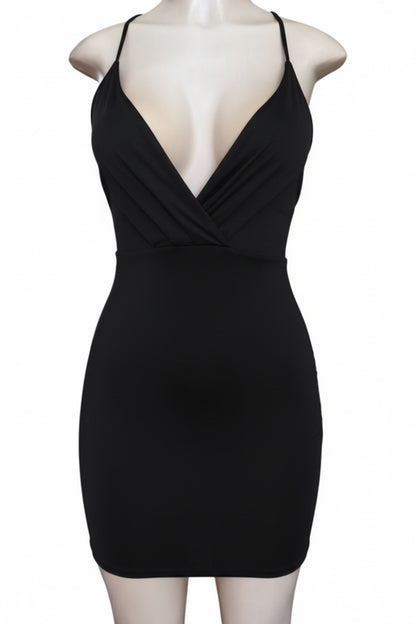 Black dress on a mannequin against a white background