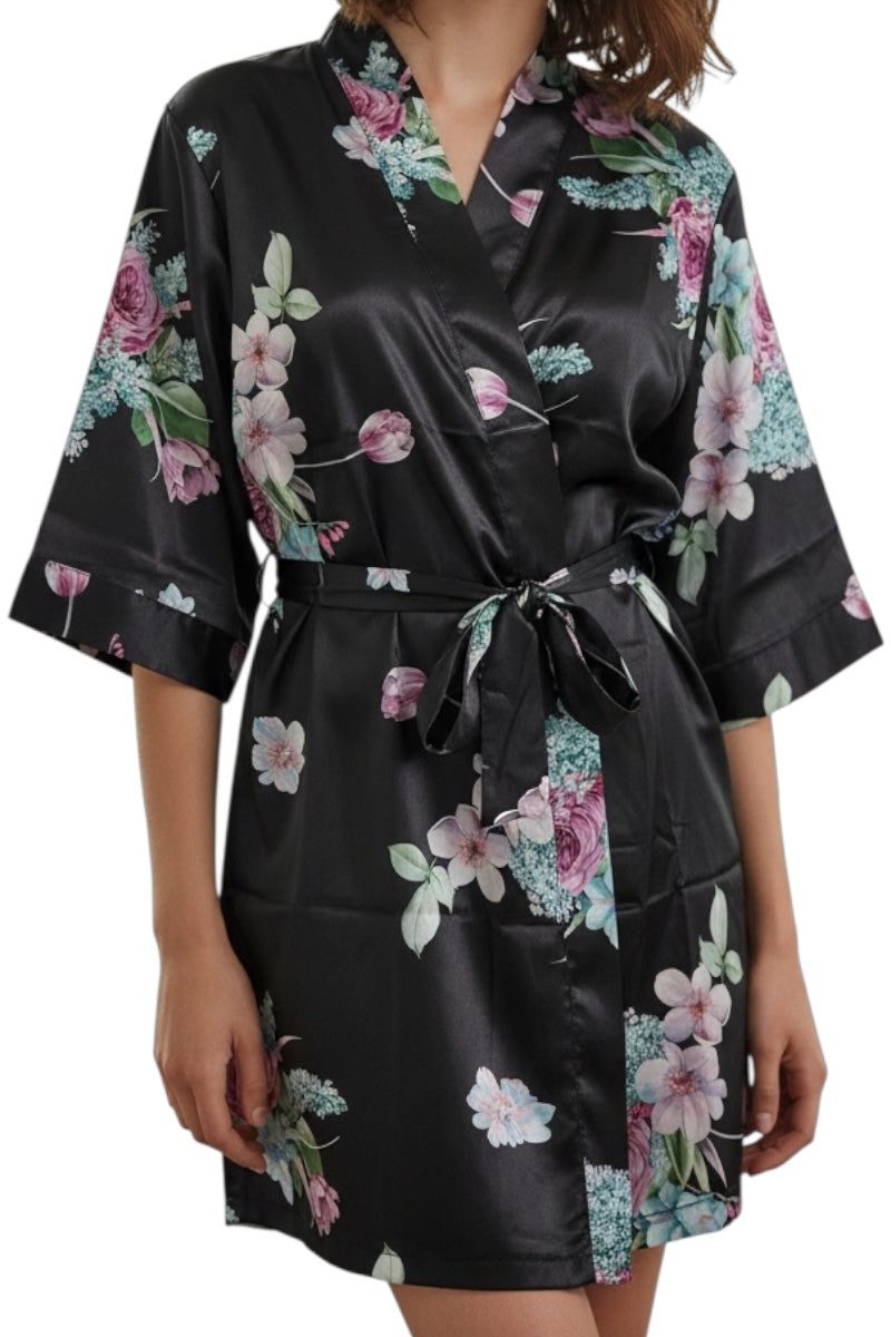 Black satin robe with floral patterns on a white background