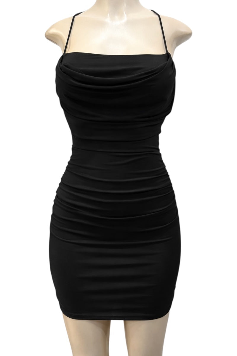 Black dress on a mannequin against a white background