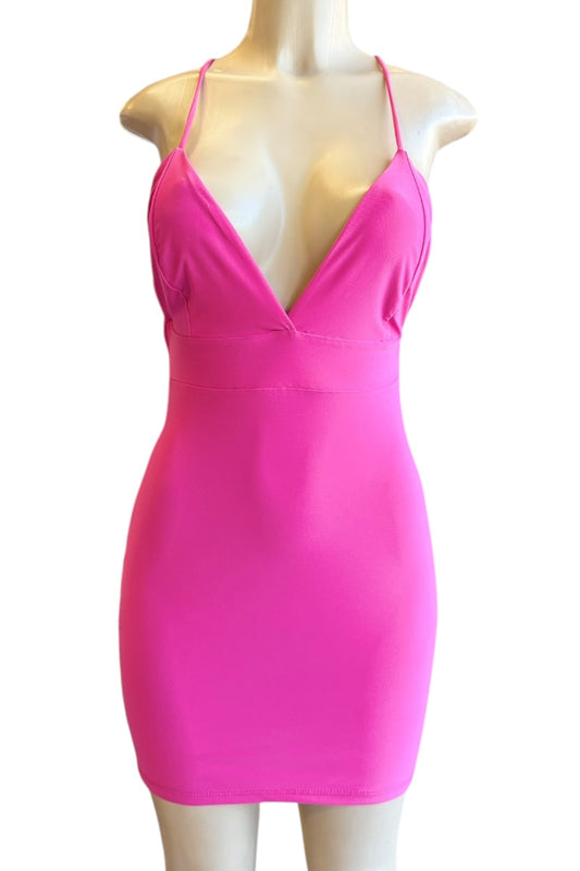 Pink dress on a mannequin against a white background