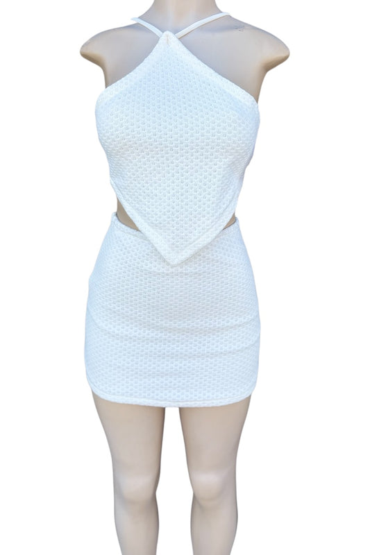 White two-piece set on a mannequin against a white background