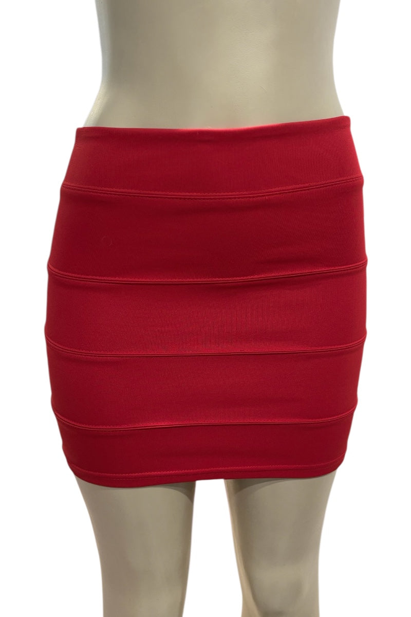 Red skirt on a mannequin against a white background