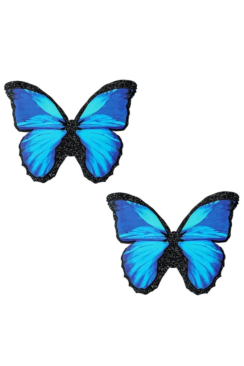 Two blue butterfly-shaped pasties on a white background