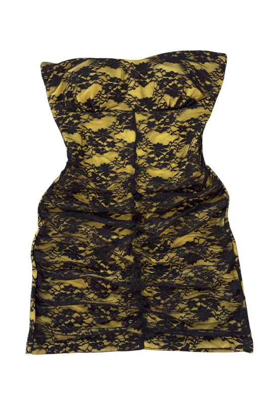 Black and yellow patterned dress on a white background